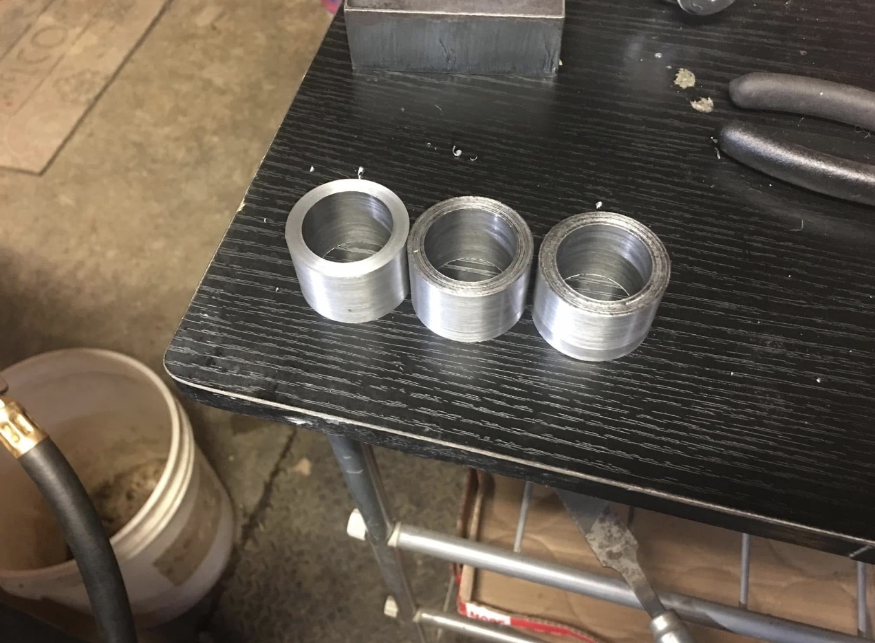 Turned aluminum bushings